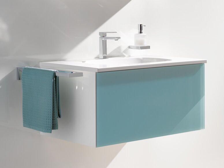 Mirror cabinet and washbasin in the colour aqua blue